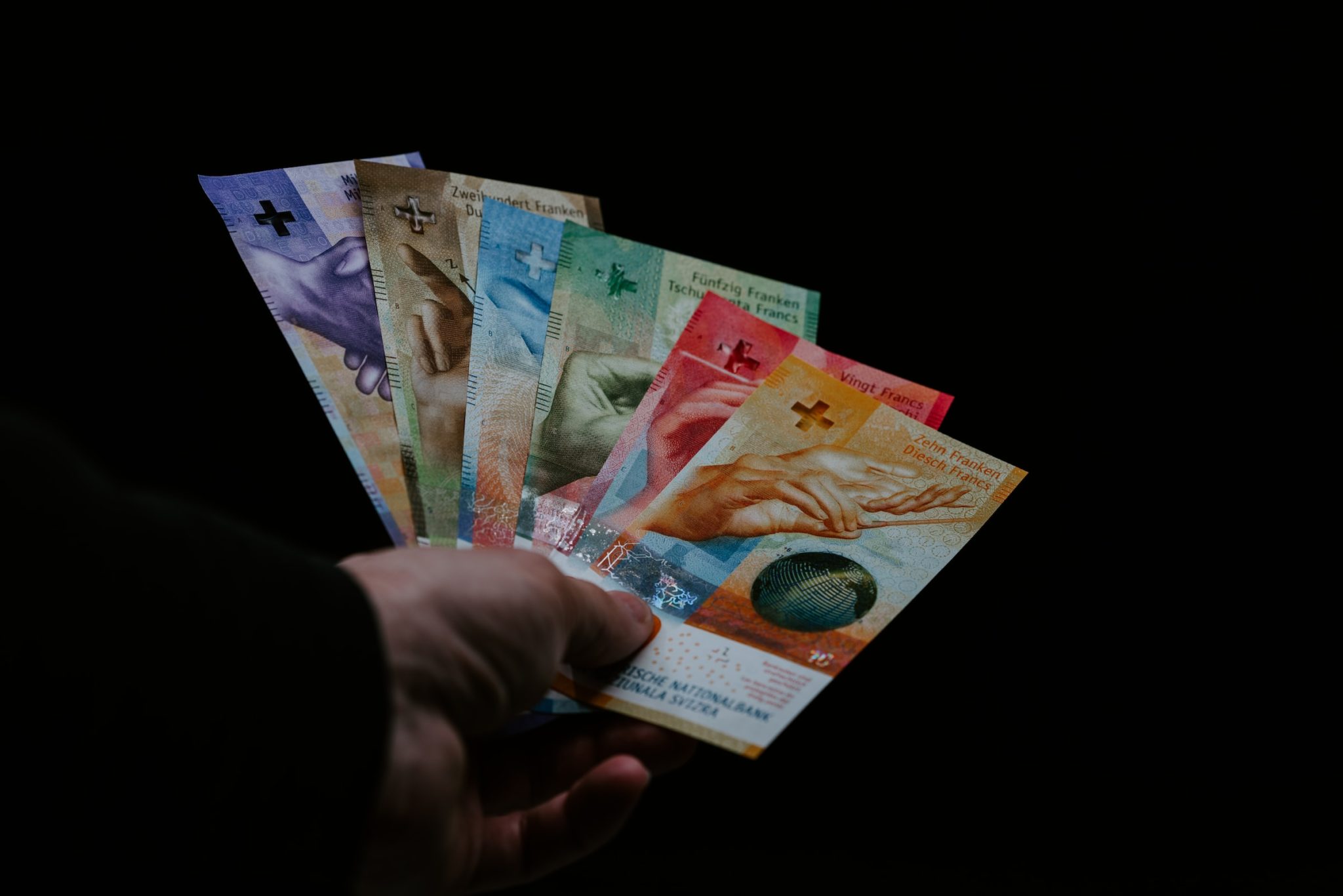 Evolution du taux de change impôts frontalier suisse